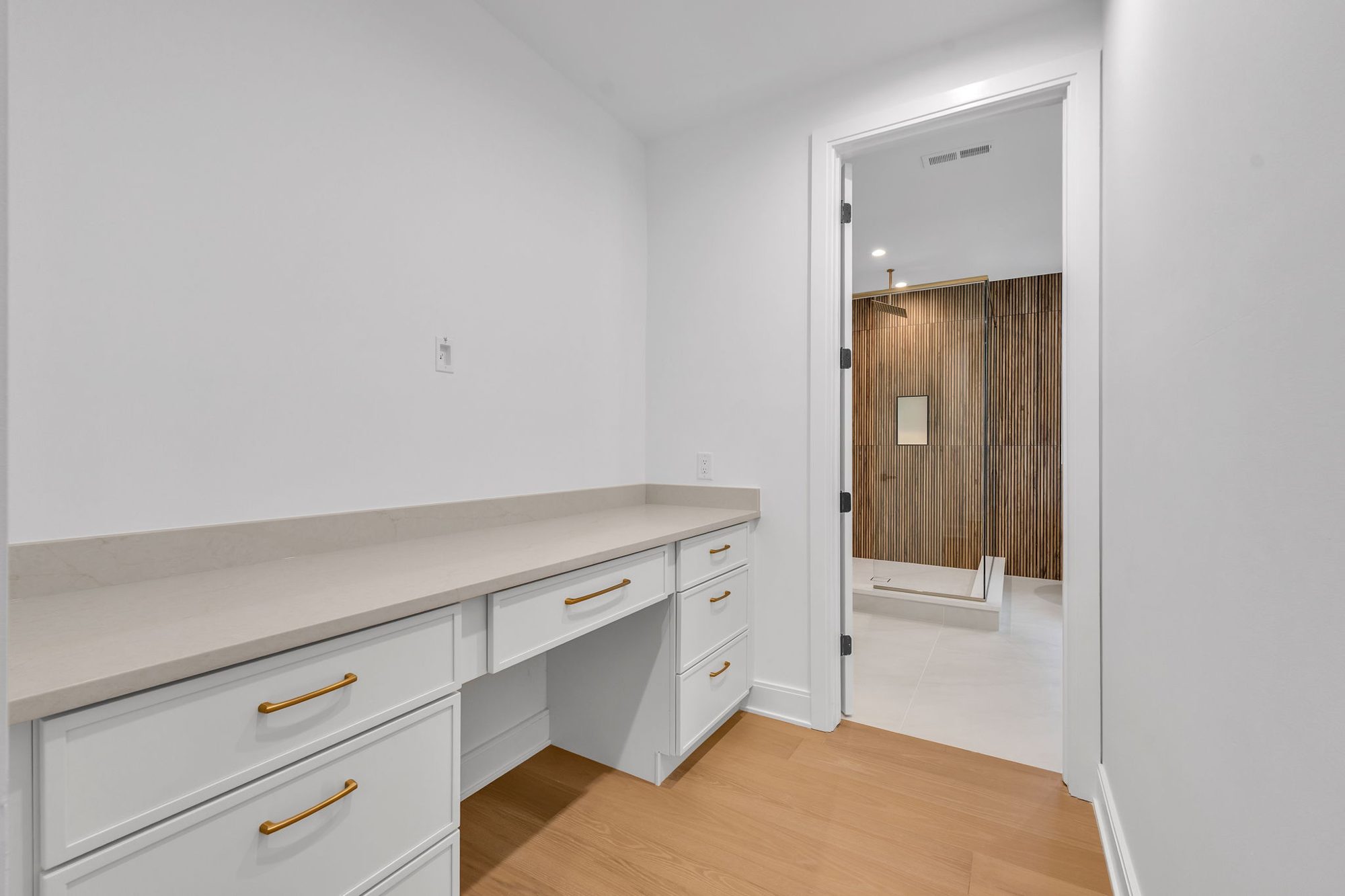 Built-in vanity desk with brass pulls
